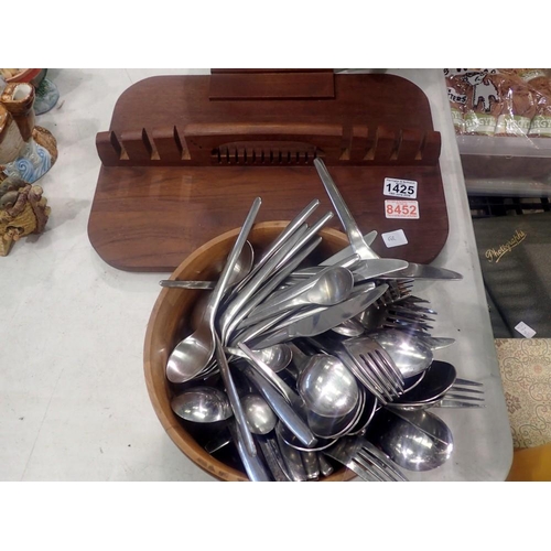 1425 - Treen bowl of mixed Japanese stainless steel cutlery and a teak cutlery stand. Not available for in-... 