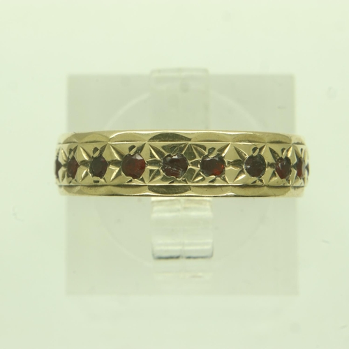 21 - 9ct gold eternity ring set with garnets, size L, 2.8g. UK P&P Group 0 (£6+VAT for the first lot and ... 