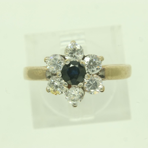 31 - 9ct gold flower ring set with sapphire and cubic zirconia, size N, 2.2g. UK P&P Group 0 (£6+VAT for ... 
