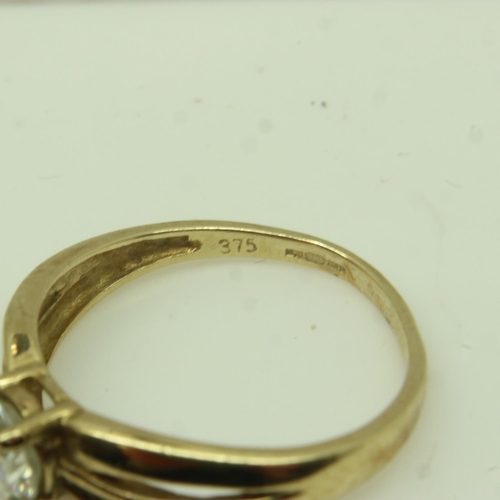 4 - 9ct gold ring set with cubic zirconia, size L, 1.7g. UK P&P Group 0 (£6+VAT for the first lot and £1... 