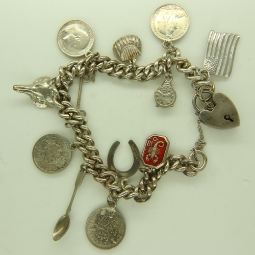 44 - Hallmarked silver charm bracelet with ten charms,  L: 18 cm, 47g. UK P&P Group 0 (£6+VAT for the fir... 