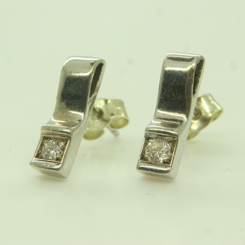 57 - A pair of 9ct white gold diamond-set earrings, combined 1.9g. UK P&P Group 0 (£6+VAT for the first l... 
