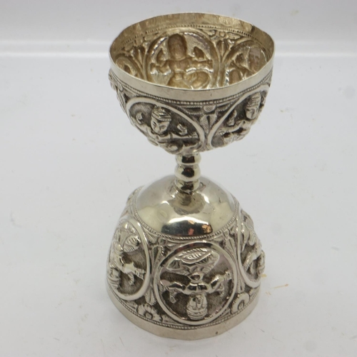 103 - An Indian silver Marriage cup, the body decorated with figures and deities, H: 10 cm, 67g. UK P&P Gr... 