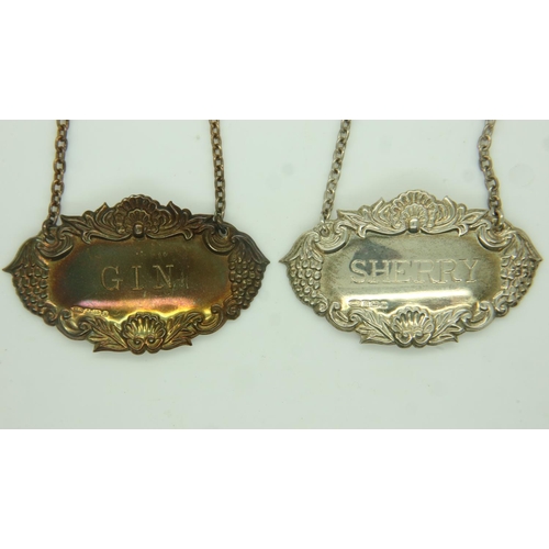 105 - Two hallmarked silver decanter labels, Gin and Sherry, combined 21g. UK P&P Group 0 (£6+VAT for the ... 