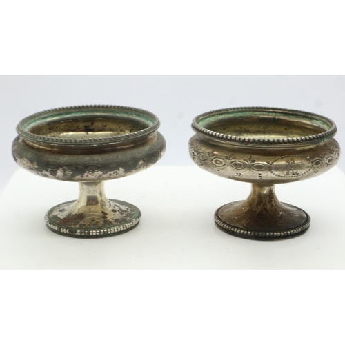 112 - A Victorian pair of hallmarked silver pedestal open salts, each H: 40 mm, combined 78g. UK P&P Group... 