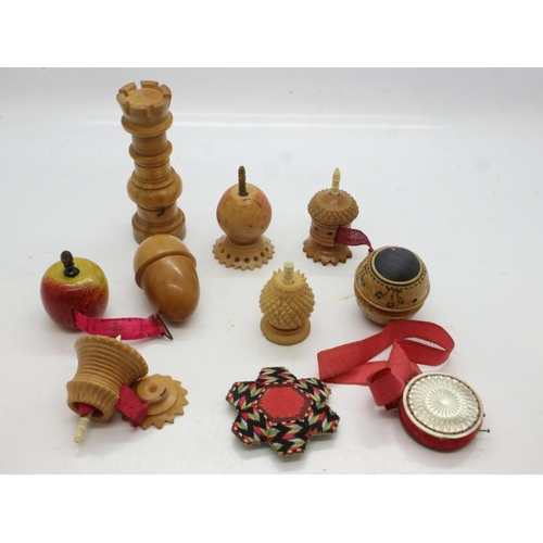 163 - Mixed miniature wooden tape measures and other treen. UK P&P Group 1 (£16+VAT for the first lot and ... 
