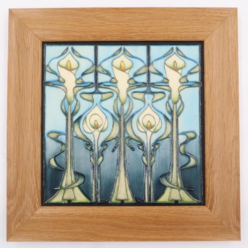 174 - Moorcroft square plaque or tile in the Calla Lily pattern, impressed marks initialled and dated, fra... 