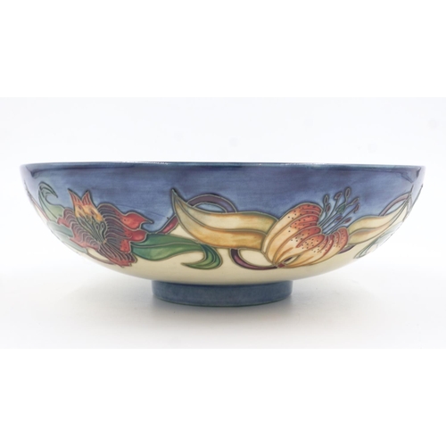 187 - Moorcroft footed centre bowl in the Anna Lily pattern, no cracks or chips, D: 26 cm. UK P&P Group 3 ... 