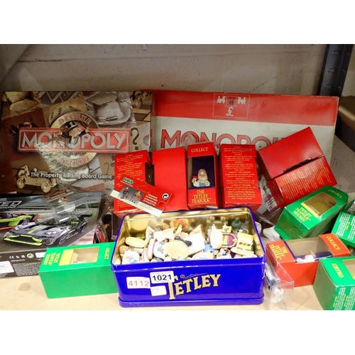 1021 - Shelf of Tetley Tea folk, loose and boxed plus Lego and Monopoly and similar. Not available for in-h... 