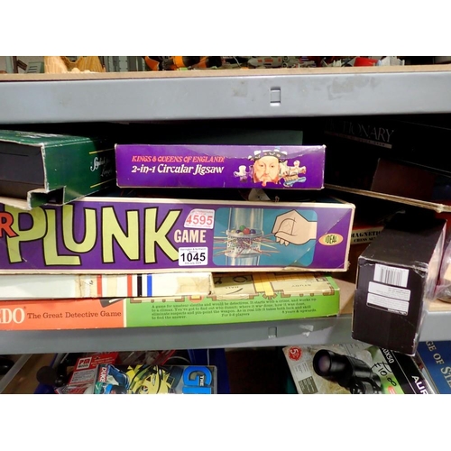 1045 - Selection of vintage board games and puzzles, including Monopoly, Cluedo and Kerplunk. Not available... 