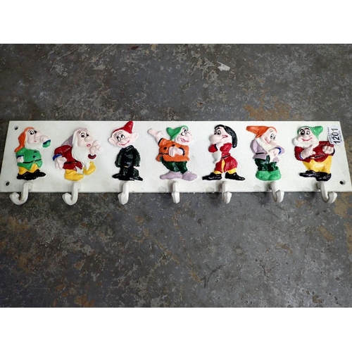 1201 - Cast iron seven dwarves cup rack, L: 60 cm. UK P&P Group 3 (£30+VAT for the first lot and £8+VAT for... 