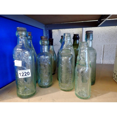 1220 - Quantity of early 20th century glass bottles including local (Atherton) examples. Not available for ... 