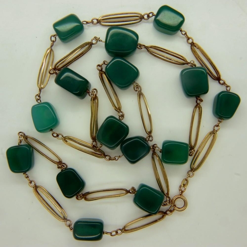 18 - 9ct gold neck chain, the extended gold links separated by polished panels of chrysoprase, closed L: ... 
