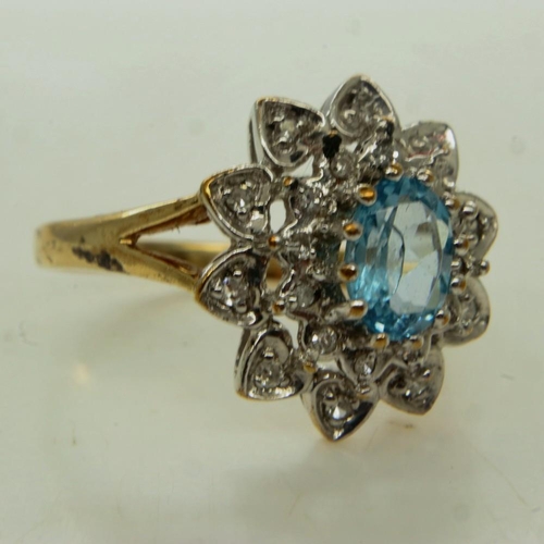 35 - 9ct gold blue topaz and diamond set cocktail ring, size O, 3.6g. UK P&P Group 0 (£6+VAT for the firs... 