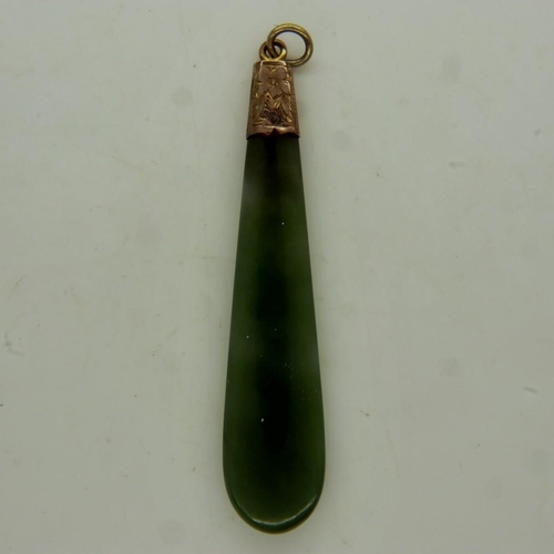 38 - A large 9ct gold mounted jade panel pendant, L: 60 mm. UK P&P Group 0 (£6+VAT for the first lot and ... 