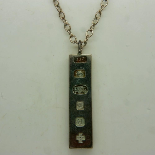 59 - Millennium hallmarked silver ingot pendant necklace, 24g. UK P&P Group 0 (£6+VAT for the first lot a... 