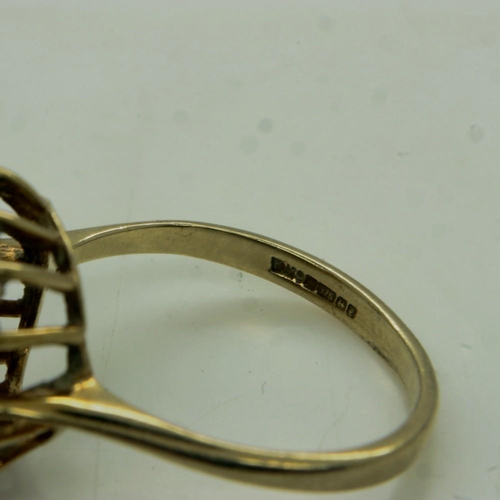 68 - A 9ct gold stone set cocktail ring, size M/N, 2.9g. UK P&P Group 0 (£6+VAT for the first lot and £1+... 