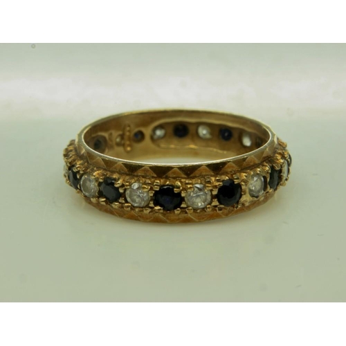 8 - 9ct gold full eternity ring, set with sapphires and white stones, size N, 3.1g. UK P&P Group 0 (£6+V... 