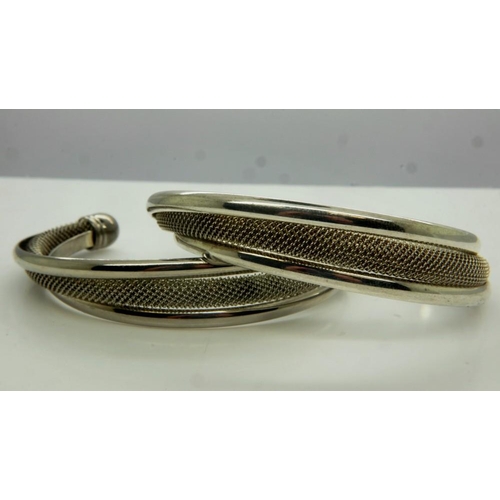 83 - TIFFANY & CO pair of vintage silver mesh torque bangles, one marked for Tiffany. UK P&P Group 1 (£16... 