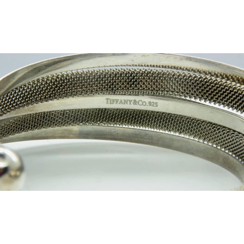 83 - TIFFANY & CO pair of vintage silver mesh torque bangles, one marked for Tiffany. UK P&P Group 1 (£16... 