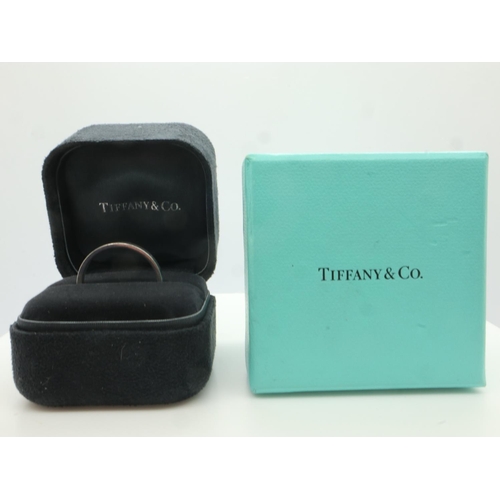 104 - TIFFANY & CO: a gents 950 platinum band ring, slim profile, size V, 6.3g, boxed. UK P&P Group 0 (£6+... 