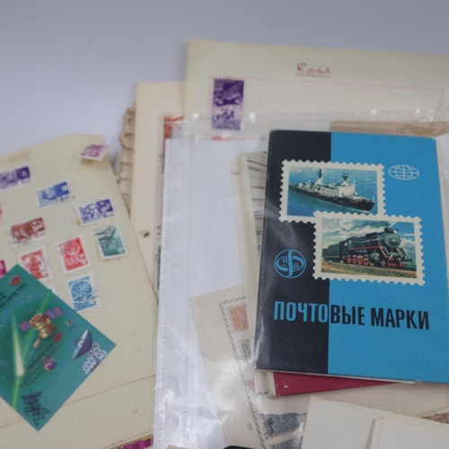 396 - Case of Russian stamps, three albums and loose pages. Without case UK P&P Group 2 (£20+VAT for the f... 