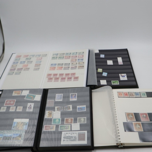 406 - Four mixed stamp albums. UK P&P Group 2 (£20+VAT for the first lot and £4+VAT for subsequent lots)