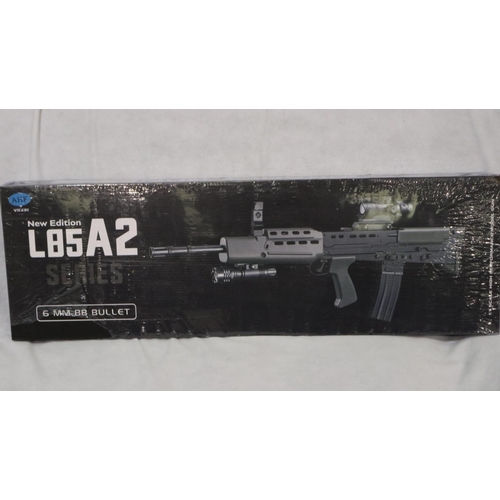 2033 - New spring powered 6mm BB rifle in black/green (L85 A1 style), boxed. UK P&P Group 3 (£30+VAT for th... 