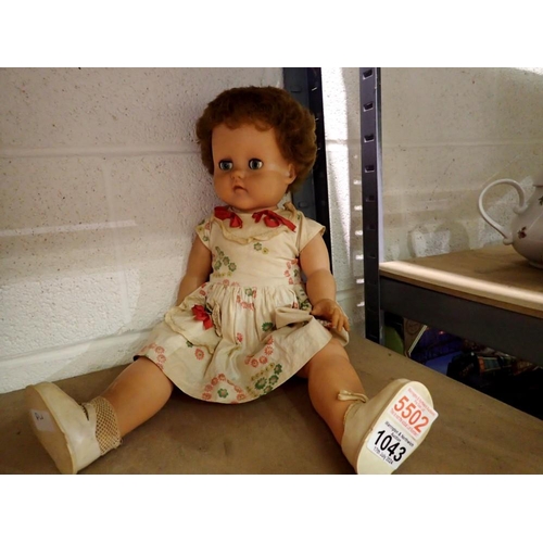 1043 - Unbranded plastic doll with sleeping eyes. UK P&P Group 2 (£20+VAT for the first lot and £4+VAT for ... 