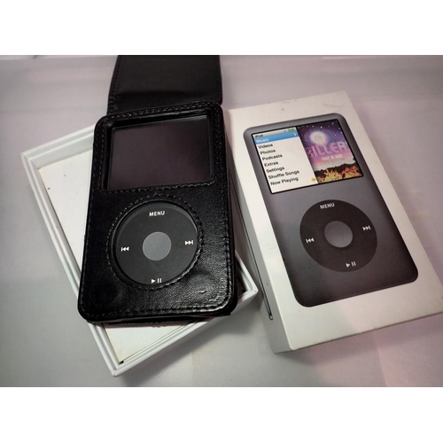 1061 - Apple Ipod Classic, 160GB, model A1238, boxed with leather case, instructions and cable. Fully worki... 