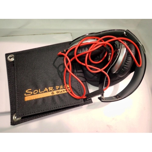 1136 - Pair of Beat Solo HD headphones with a 6 watt solar phone panel phone charger. UK P&P Group 1 (£16+V... 