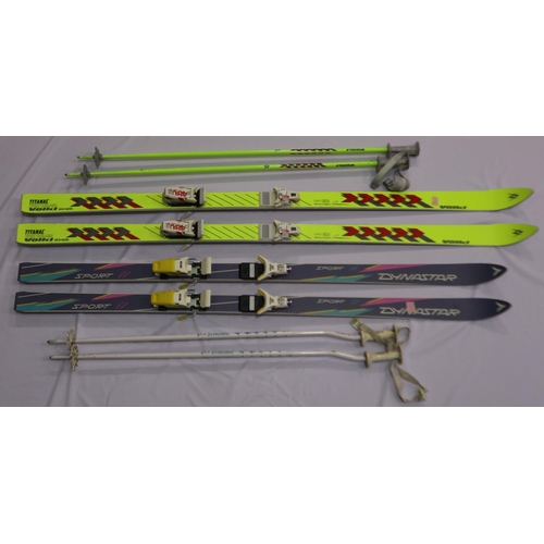 2001 - Dynastar pair of carbon fibre skis, and Renntiger Competition skis with two pairs of poles. Not avai... 