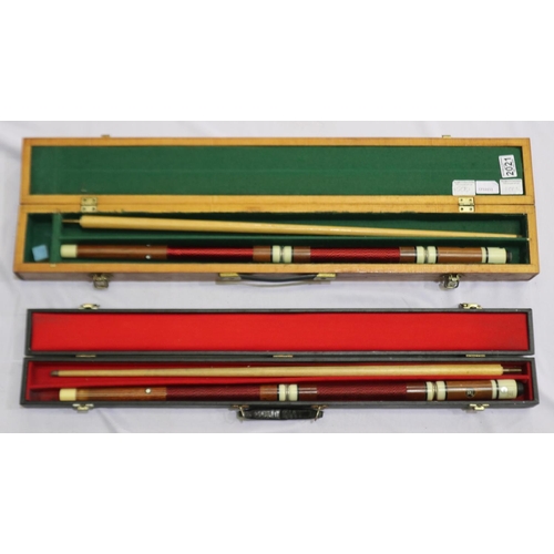 2021 - Two cased Riley four piece pool cues. Not available for in-house P&P