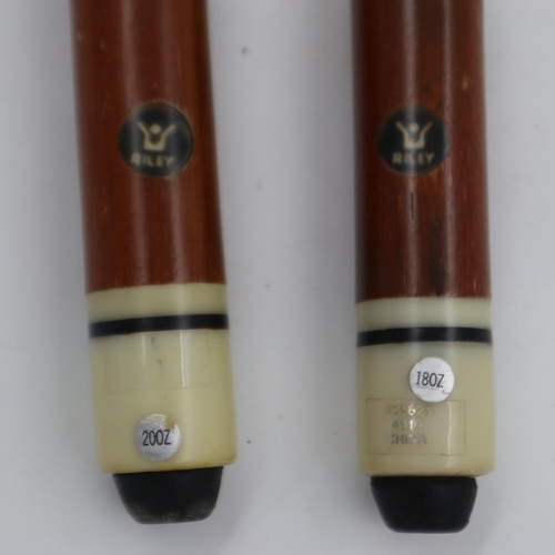 2021 - Two cased Riley four piece pool cues. Not available for in-house P&P