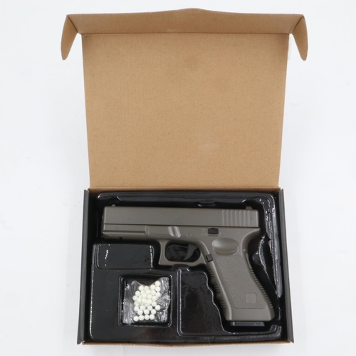 2030 - Airsoft pistol, model V20 in brown, boxed. UK P&P Group 1 (£16+VAT for the first lot and £2+VAT for ... 