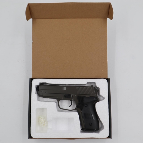 2037 - Airsoft pistol, model V12 in brown, boxed. P&P Group 2 (£18+VAT for the first lot and £3+VAT for sub... 