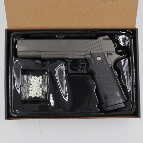 2042 - Airsoft pistol, model V19 in brown, boxed. P&P Group 2 (£18+VAT for the first lot and £3+VAT for sub... 