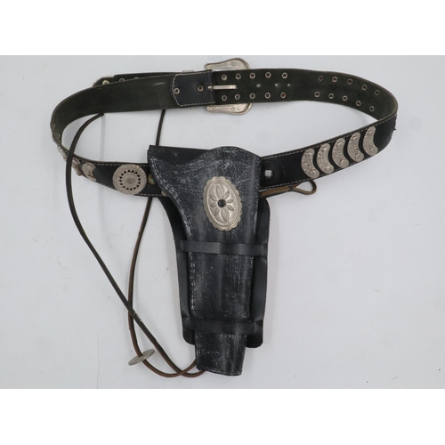 2047 - Western style black leather Colt holster on a metal studded belt. UK P&P Group 1 (£16+VAT for the fi... 