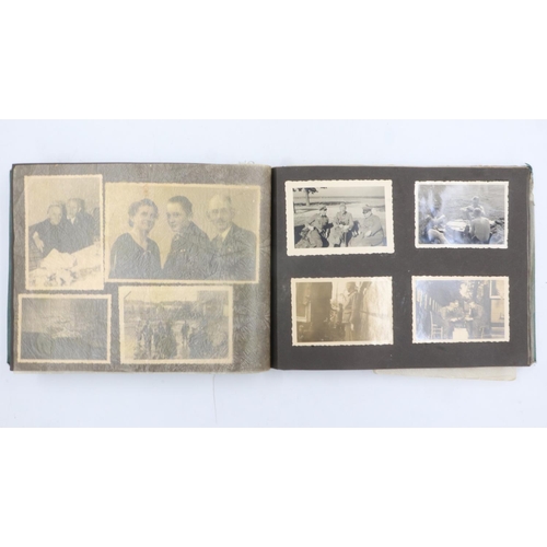 2082 - WWII German photograph album containing a collection of snapshot photos from the 12th Machine Gun Co... 