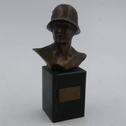 2104 - A post-war bronze bust of a German soldier, raised on a black marble plinth, H: 18 cm. UK P&P Group ... 