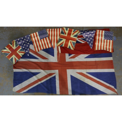 2125 - Flags: A 20th century British ensign of multi-piece construction, printed Union flag and bunting for... 