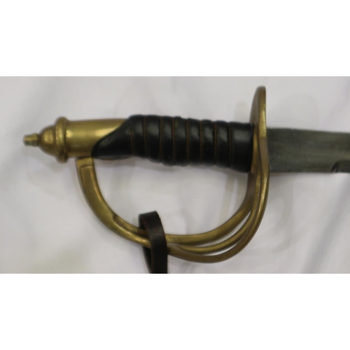 2128 - A 20th century cavalry sabre, with wired leather bound grip and brass guard, with steel scabbard. No... 