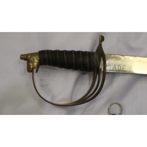 2129 - A modern Indian sabre with velvet scabbard. Not available for in-house P&P