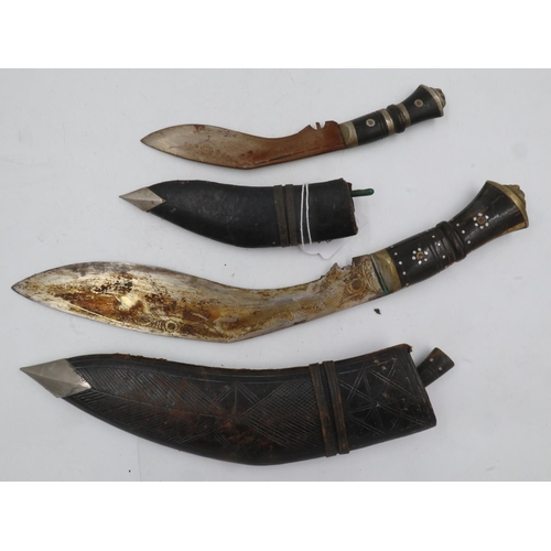 2146 - Kukri in leather scabbard and a smaller example. UK P&P Group 2 (£20+VAT for the first lot and £4+VA... 