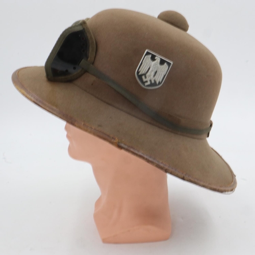 2159 - WWII Mk II German Afrika Korps Tropical helmet including sand goggles. There is a small field repair... 