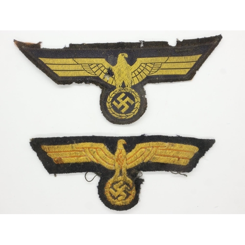 2180 - WWII period Kriegsmarine embroidered chest eagle, with a further bullion cap eagle, both with small ... 