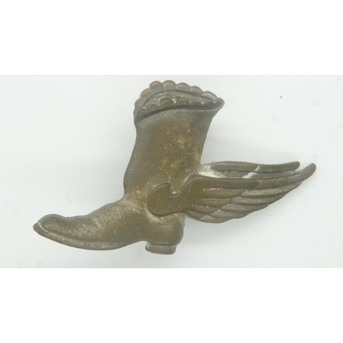 2202 - WWII Late Arrivals Club winged boot badge. An unofficial award given to RAF pilots or crew members w... 