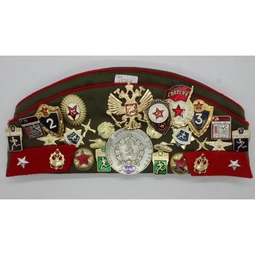 2236 - Soviet Russian forage cap, mounted with a multitude of badges and insignia. UK P&P Group 1 (£16+VAT ... 