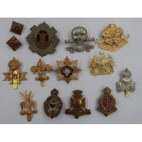 2242 - Collection of British WWII and later regimental cap badges. UK P&P Group 1 (£16+VAT for the first lo... 