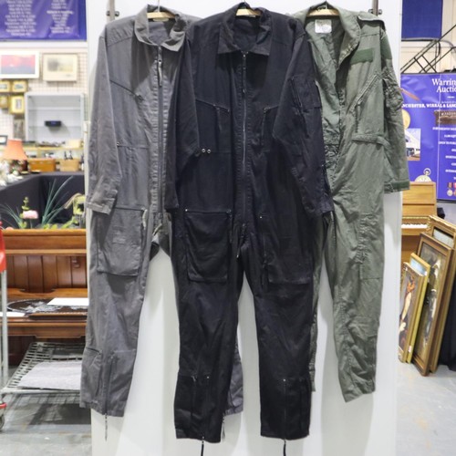 2163A - Three contemporary flight suits, in grey, olive green and black (olive green example zip is broken).... 